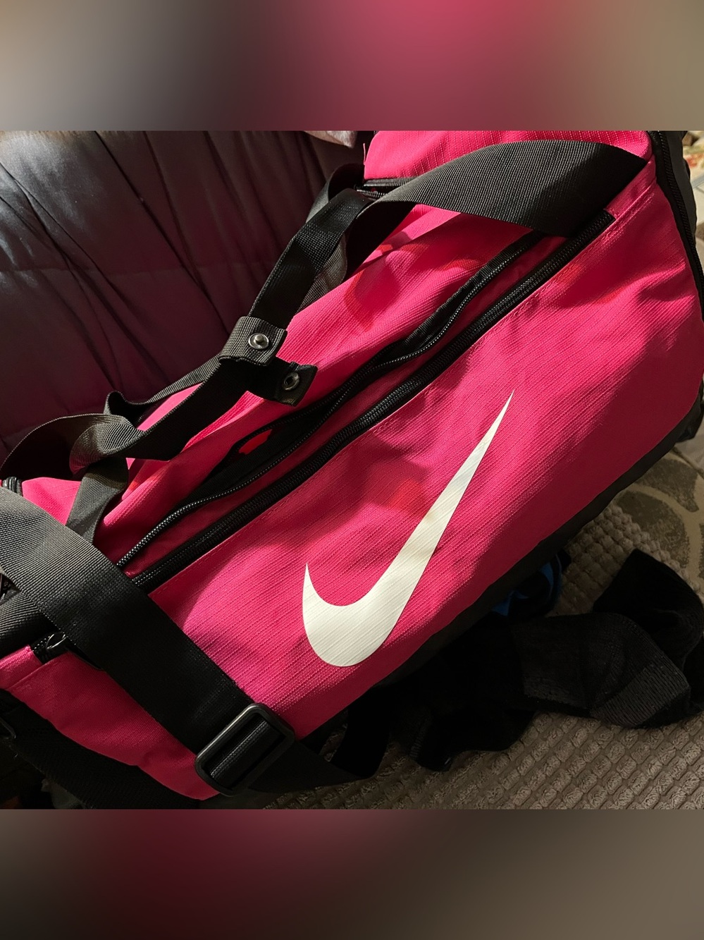Nike ~Pink Duffel Bag with White Swoosh and Black Straps